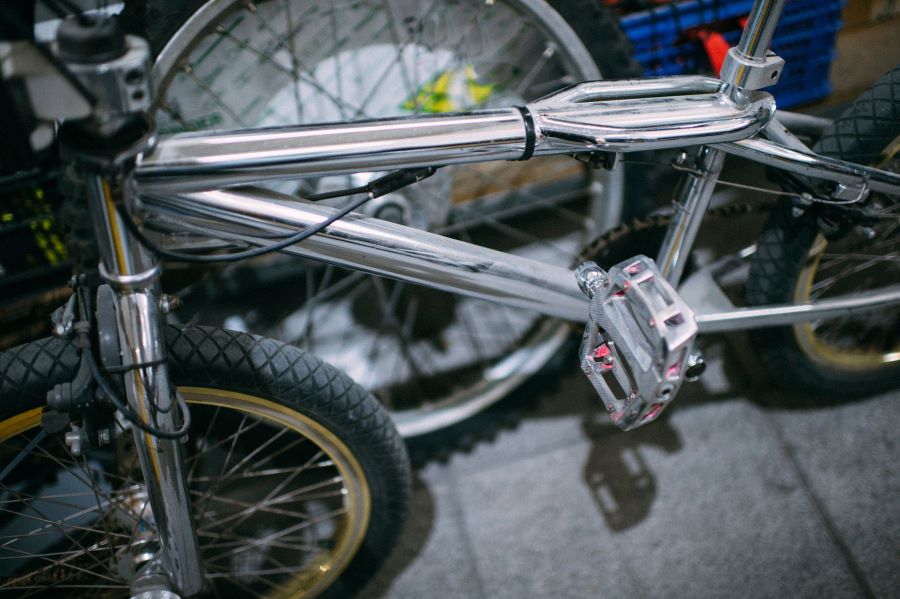 A close up of the brakes on a BMX bike
