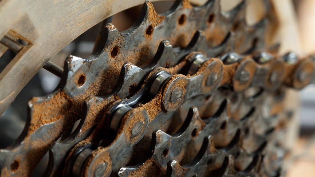 An old, worn out and rusted bike cassette