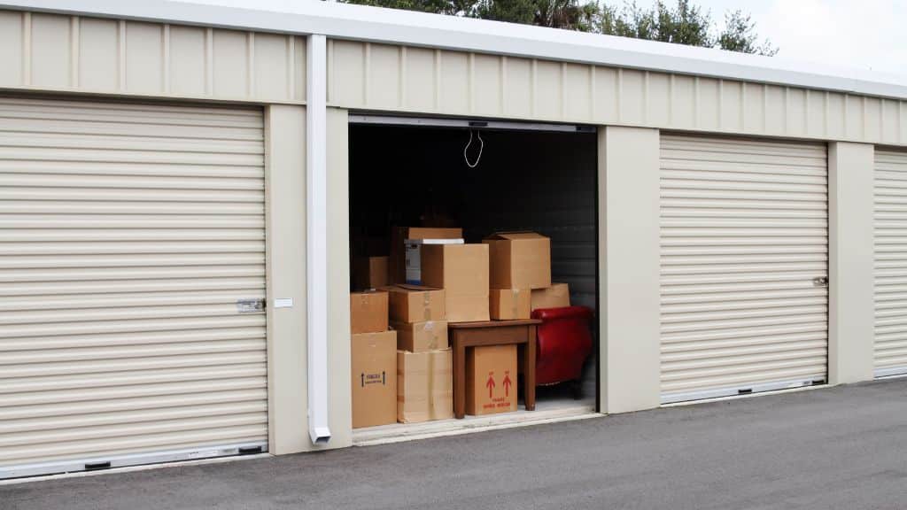A storage unit with boxes of personal belongings loaded into it.