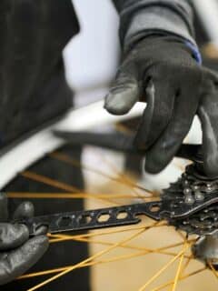A Mechanic Removing A Bike Cassette,